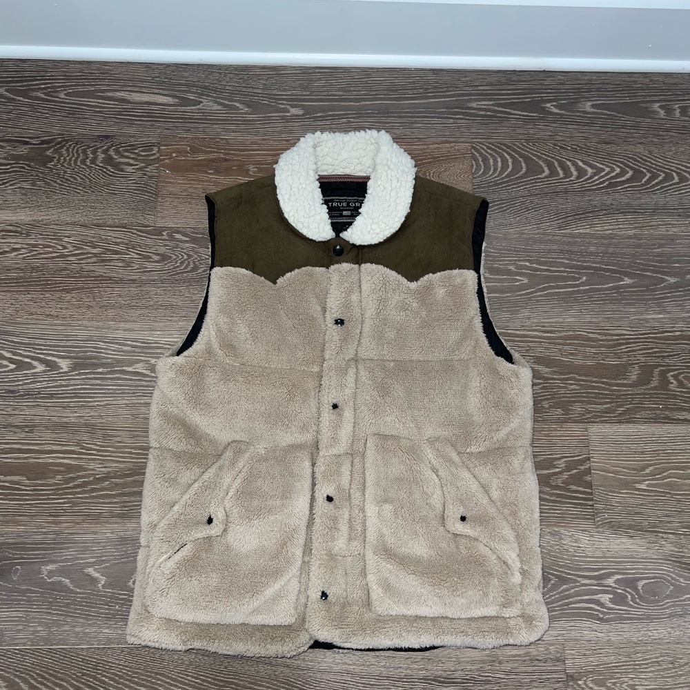 Men’s True Grit vest. Practically brand new.